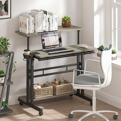 Mobile Standing Desk, Adjustable Rolling Computer Desk with 3 Desktops, Portable Laptop Table with Cup Holder, Home Office Laptop Workstation on Lockable Wheels, Grey Oak