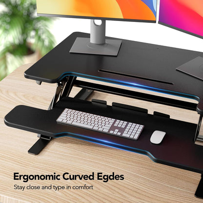 HUANUO 36" Z Shaped Stable Electric Standing Desk Converter, Height Adjustable Sit Stand Up Desk Riser, Dual Monitor and Laptop Workstation with Wide Keyboard Tray, Desk Lifter for Home Office